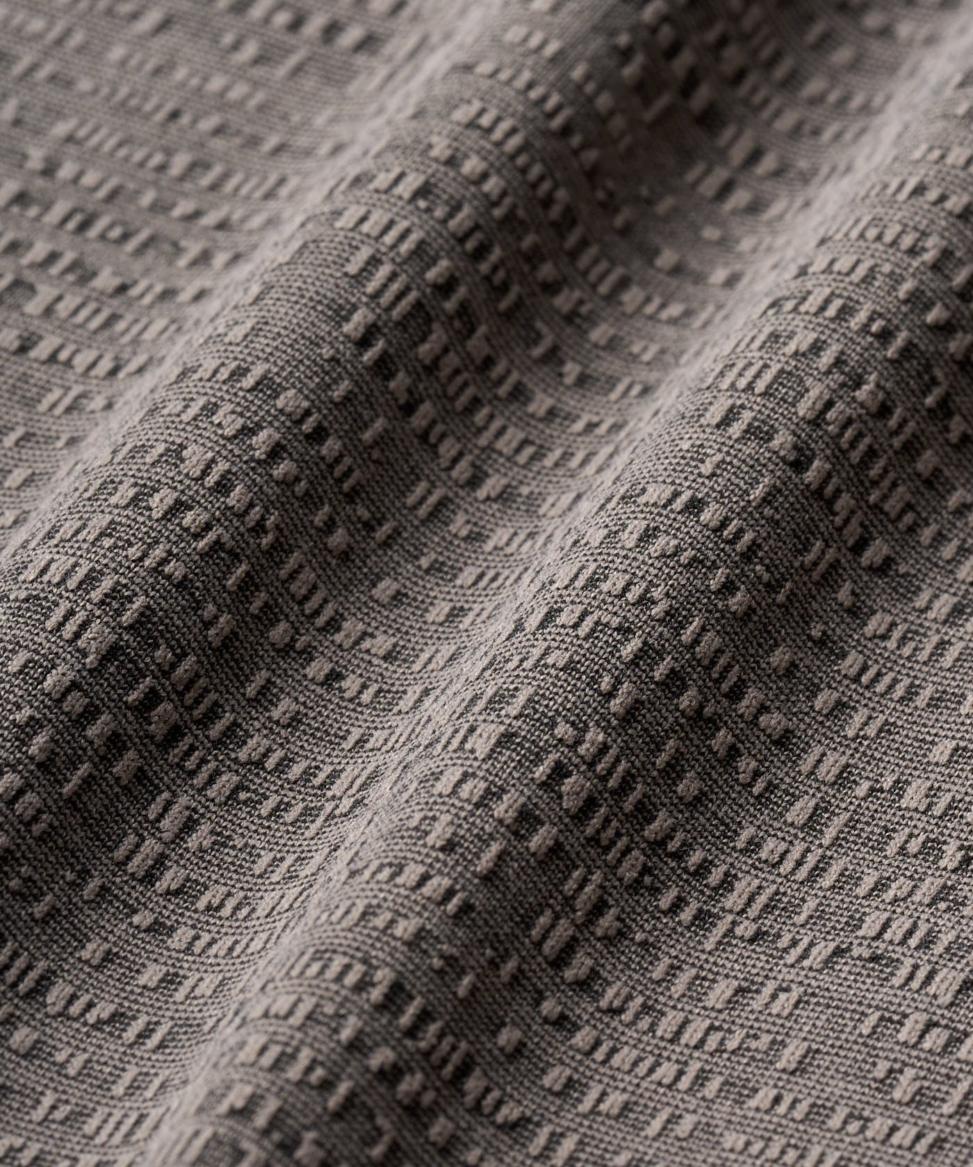 Ridgeweave Pleated Shorts - Jet Grey flatlay macros