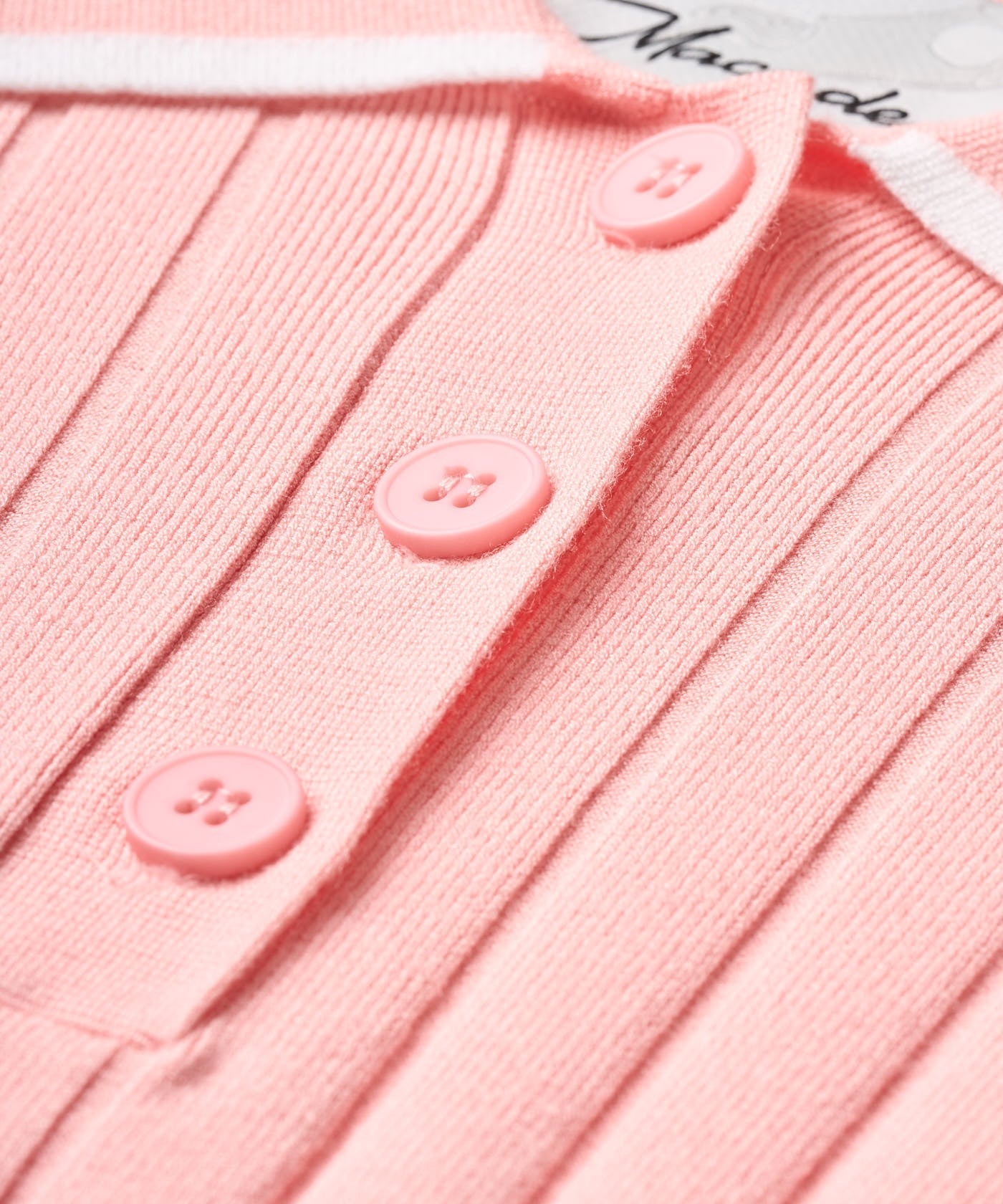 Skye Course Knit Polo - Coral flatlay 10